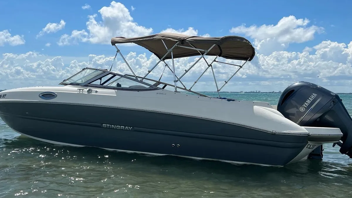 A 24-foot private boat anchored near a sandbar during a 4-hour private boat tour in Miami on Biscayne Bay